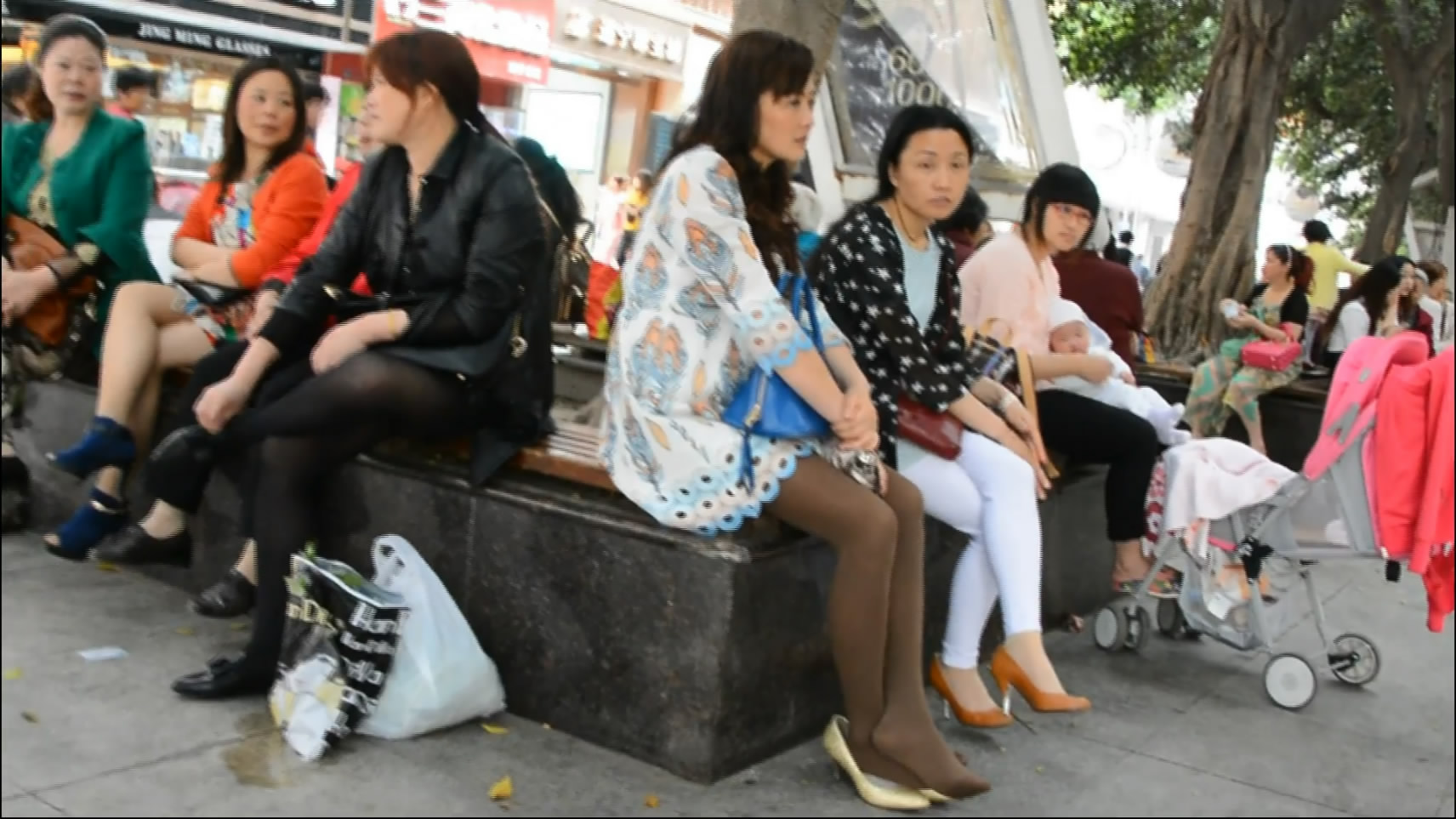 Brown Stocking with golden high heels and dangling feet